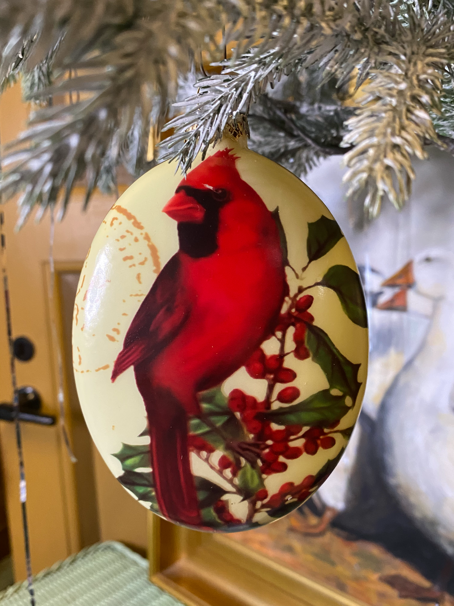 Glas ornament med rød kardinal